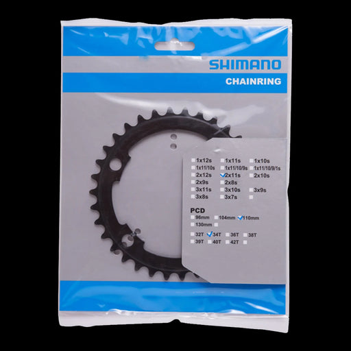 Shimano chainring packaging with specifications on a white background