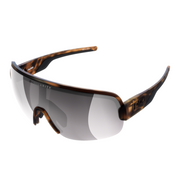 Sunglasses with tortoiseshell frame and reflective lenses on a white background
