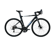 A black drop-bar road bicycle with a sleek carbon fiber frame, featuring a subtle gray gradient near the top tube and blue branding text, shown against a solid white background.
