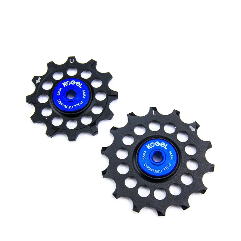 The Kogel 12/14T Oversized Pulley Set includes two black wheels with blue centers, multiple holes, and ceramic bearings for smoothness. Designed for Shimano road derailleurs, they're labeled “U” and “L” for upper and lower positions.