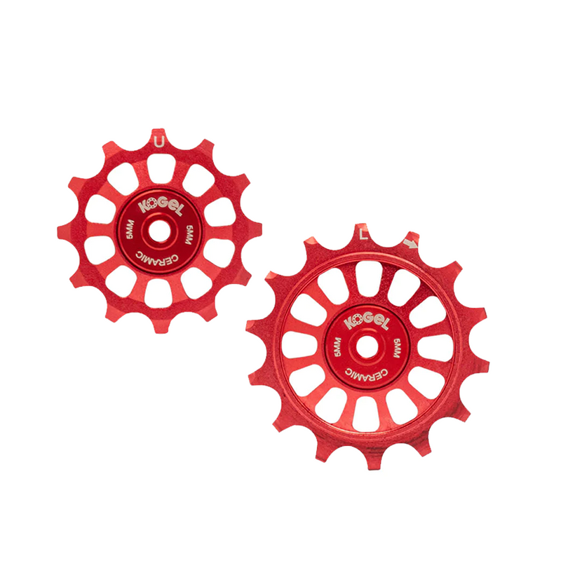 The Kogel 12/14T Oversized Pulley Set features two red, round derailleur pulleys with multiple spokes and central holes for Shimano road derailleurs, both marked with "Kogel" and "Ceramic" to highlight the ceramic bearings.