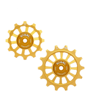 Two gold Kogel 12/14T Oversized Pulley Sets for Shimano road derailleurs, each with multiple spokes and "ceramic" branding, shown on a plain white background and equipped with ceramic bearings.